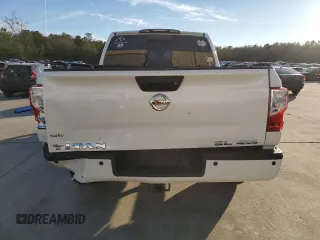 2018 Nissan Titan Pro-4X z VIN 1N6AA1E58JN520184, wystawiony jako Copart lot #88111315 z przebiegiem 93 326 mil mil oraz Szkoda całkowita • Salvage title. Historia ofert i sprzedaży dostępna na DreamBid. Obrazek 6.