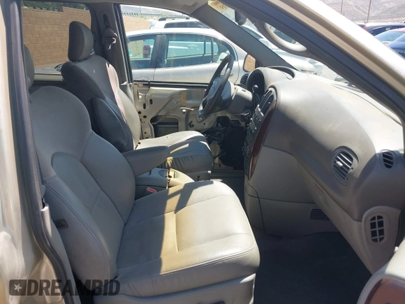 2001 Chrysler Town & Country Limited with VIN 2C8GP64L31R241168, listed as a IAAI auction lot 42094315 with 213,800 mi miles. Bid and sale history available at carsss.com. Image 5.
