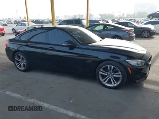2015 BMW 4 Series 428i with VIN WBA4A9C52FGL85228, listed as a IAAI auction lot 41228043 with 152,729 mi miles and . Bid and sale history available at DreamBid. Image 13.