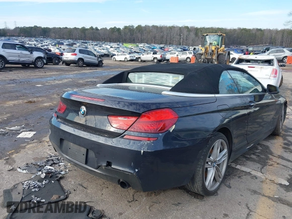 2012 BMW 6 Series 640i z VIN WBALW7C52CC618691, wystawiony jako IAAI lot #41305802 z przebiegiem Nie podano mil oraz . Historia ofert i sprzedaży dostępna na DreamBid. Obrazek 4.