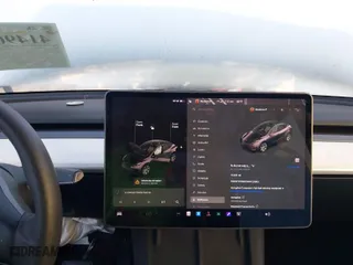 2021 Tesla Model Y Standard Range with VIN 5YJYGDED4MF121963, listed as a IAAI auction lot 41490477 with 41,941 mi miles. Bid and sale history available at carsss.com. Image 18.