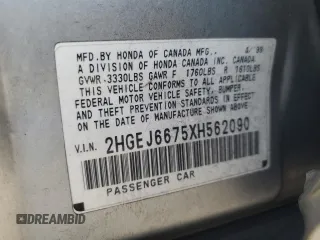 1999 Honda Civic LX z VIN 2HGEJ6675XH562090, wystawiony jako Copart lot #54111445 z przebiegiem 202 417 mil mil oraz Czysty tytuł • Clean title. Historia ofert i sprzedaży dostępna na DreamBid. Obrazek 12.