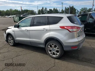2013 Ford Escape SEL with VIN 1FMCU9HX6DUC11401, listed as a Copart auction lot 64862055 with 119,733 mi miles and Clean title. Bid and sale history available at DreamBid. Image 2.