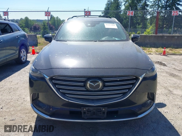 2018 Mazda CX-9 Grand Touring z VIN JM3TCBDY2J0237050, wystawiony jako IAAI lot #42457060 z przebiegiem 130 625 mil mil oraz . Historia ofert i sprzedaży dostępna na DreamBid. Obrazek 12.