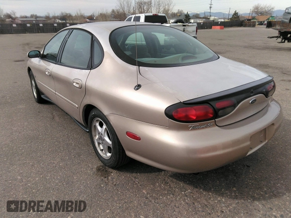 1999 Ford Taurus SE with VIN 1FAFP53S9XA330603, listed as a IAAI auction lot 41819819 with 207,025 mi miles. Bid and sale history available at carsss.com. Image 3.
