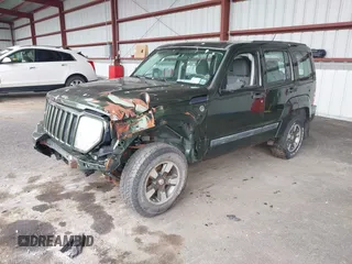 2008 Jeep Liberty Sport with VIN 1J8GN28K98W232003, listed as a IAAI auction lot 42127476 with 129,286 mi miles. Bid and sale history available at carsss.com. Image 2.