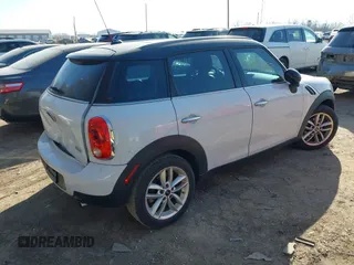2012 MINI Countryman z VIN WMWZB3C51CWM03056, wystawiony jako IAAI lot #41743353 z przebiegiem 117 290 mil mil oraz . Historia ofert i sprzedaży dostępna na DreamBid. Obrazek 4.