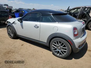 2012 MINI Coupe S z VIN WMWSX3C53CT155039, wystawiony jako Copart lot #56140175 z przebiegiem 114 339 mil mil oraz Nie do naprawy • Non repairable. Historia ofert i sprzedaży dostępna na DreamBid. Obrazek 2.