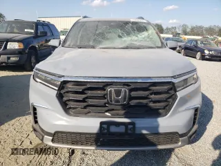 2024 Honda Pilot Touring with VIN 5FNYG2H70RB015463, listed as a Copart auction lot 73832964 with 14,606 mi miles and Salvage title. Bid and sale history available at DreamBid. Image 5.