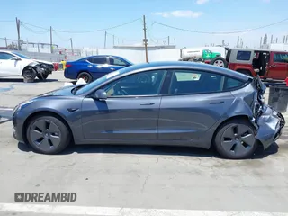 2023 Tesla Model 3 z VIN 5YJ3E1EA6PF694419, wystawiony jako IAAI lot #42268637 z przebiegiem 17 419 mil mil oraz . Historia ofert i sprzedaży dostępna na DreamBid. Obrazek 14.