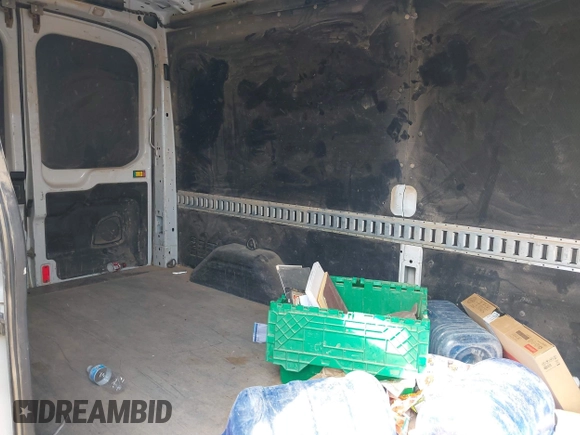 2018 Ford Transit with VIN 1FTBW2CM6JKA88298, listed as a IAAI auction lot 42112029 with 119,425 mi miles and . Bid and sale history available at DreamBid. Image 8.