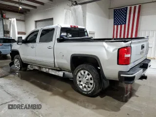 2018 GMC Sierra 2500HD Denali z VIN 1GT12UEY3JF252702, wystawiony jako Copart lot #55387655 z przebiegiem 75 059 mil mil oraz Szkody całkowita. Historia ofert i sprzedaży dostępna na DreamBid. Obrazek 2.