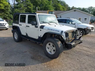 2010 Jeep Wrangler Unlimited Rubicon z VIN 1J4HA6H18AL133860, wystawiony jako IAAI lot #42875026 z przebiegiem 163 141 mil mil oraz . Historia ofert i sprzedaży dostępna na DreamBid. Obrazek 1.