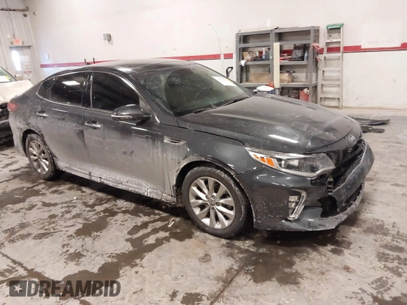 2018 Kia Optima LX with VIN 5XXGT4L30JG241236, listed as a IAAI auction lot 41612332 with 73,494 mi miles. Bid and sale history available at carsss.com. Image 1.