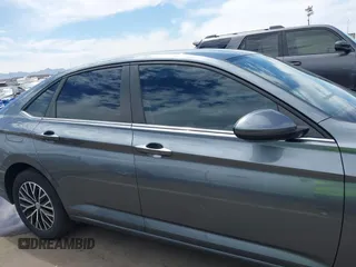 2021 Volkswagen Jetta S z VIN 3VWC57BU1MM024086, wystawiony jako IAAI lot #42009047 z przebiegiem 48 280 mil mil oraz . Historia ofert i sprzedaży dostępna na DreamBid. Obrazek 13.