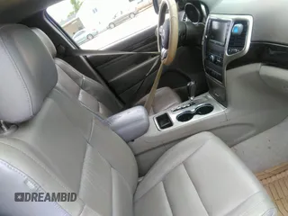 2012 Jeep Grand Cherokee Laredo with VIN 1C4RJEAGXCC157616, listed as a IAAI auction lot 42156539 with 301,661 mi miles. Bid and sale history available at carsss.com. Image 5.