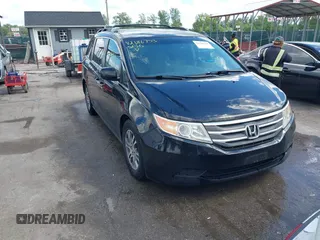 2012 Honda Odyssey EX z VIN 5FNRL5H47CB082060, wystawiony jako IAAI lot #42186753 z przebiegiem 146 957 mil mil oraz . Historia ofert i sprzedaży dostępna na DreamBid. Obrazek 1.