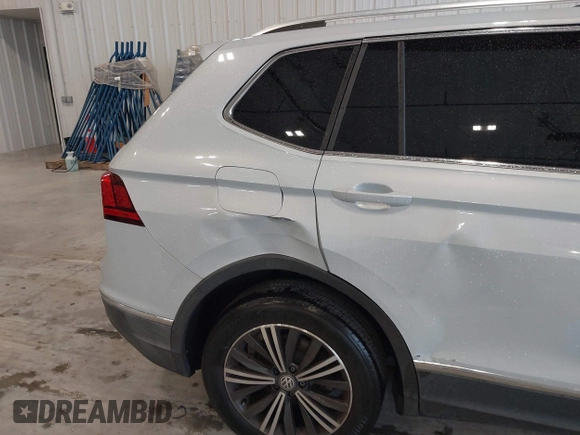 2019 Volkswagen Tiguan SE with VIN 3VV3B7AX9KM030028, listed as a IAAI auction lot 40445099 with 85,400 mi miles and . Bid and sale history available at DreamBid. Image 18.