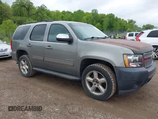 2012 Chevrolet Tahoe LT z VIN 1GNSKBE05CR215985, wystawiony jako IAAI lot #42357617 z przebiegiem 201 363 mil mil oraz . Historia ofert i sprzedaży dostępna na DreamBid. Obrazek 1.