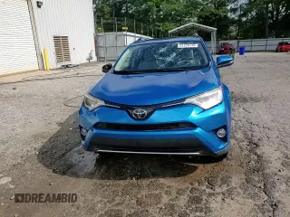 2018 Toyota RAV4 XLE with VIN JTMWFREV4JJ205768, listed as a Copart auction lot 61226145 with 102,541 mi miles and Non repairable. Bid and sale history available at DreamBid. Image 14.