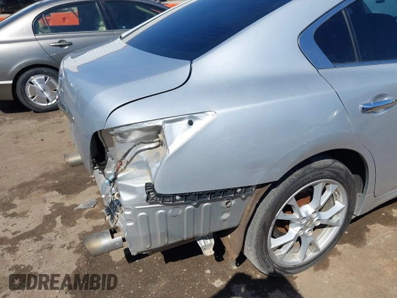 2013 Nissan Maxima SV with VIN 1N4AA5AP4DC828945, listed as a IAAI auction lot 41995127 with 169,754 mi miles and . Bid and sale history available at DreamBid. Image 6.