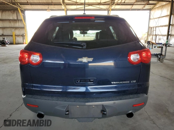 2012 Chevrolet Traverse LTZ z VIN 1GNKRLED9CJ332651, wystawiony jako Copart lot #55253655 z przebiegiem 128 113 mil mil oraz Szkoda całkowita • Salvage title. Historia ofert i sprzedaży dostępna na DreamBid. Obrazek 6.