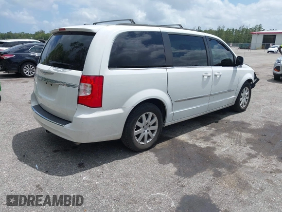 2016 Chrysler Town & Country Touring with VIN 2C4RC1BG5GR268623, listed as a IAAI auction lot 41966933 with 172,235 mi miles. Bid and sale history available at carsss.com. Image 4.