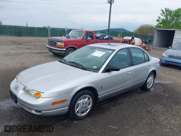 2002 Saturn SL z VIN 1G8ZK52762Z131497, wystawiony jako IAAI lot #42086108 z przebiegiem 119 273 mil mil oraz . Historia ofert i sprzedaży dostępna na DreamBid. Obrazek 2.