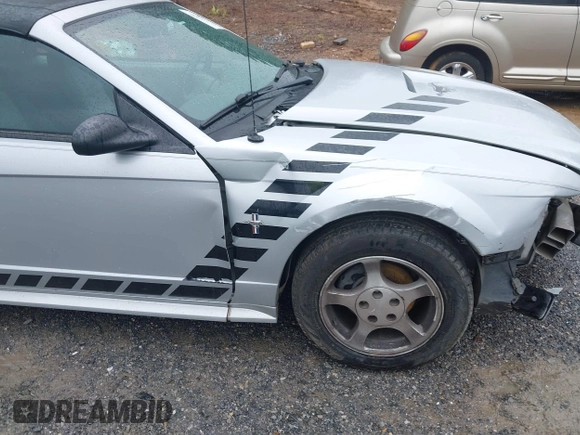 2002 Ford Mustang Deluxe z VIN 1FAFP44492F221578, wystawiony jako IAAI lot #42242232 z przebiegiem 107 773 mil mil oraz . Historia ofert i sprzedaży dostępna na DreamBid. Obrazek 6.