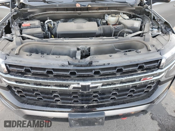 2021 Chevrolet Suburban Z71 with VIN 1GNSKDKDXMR310076, listed as a Copart auction lot 43055185 with 88,300 mi miles and Salvage title. Bid and sale history available at DreamBid. Image 12.