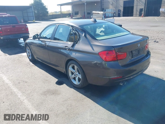 2014 BMW 3 Series 328i with VIN WBA3C1C57EK116483, listed as a IAAI auction lot 42697759 with 113,010 mi miles and . Bid and sale history available at DreamBid. Image 3.