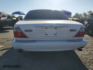 2001 Jaguar XJ VDP with VIN SAJDA24C11LF28715, listed as a Copart auction lot 65246334 with 107,965 mi miles and Salvage Title. Bid and sale history available at carsss.com. Image 6.