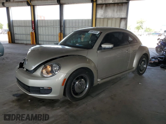2012 Volkswagen Beetle 2.5L with VIN 3VWHX7AT5CM643314, listed as a Copart auction lot 58843455 with 72,448 mi miles and Salvage title. Bid and sale history available at DreamBid. Image 1.
