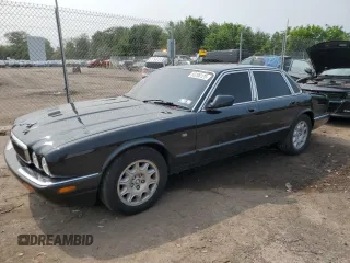 2001 Jaguar XJ with VIN SAJDA14C91LF37169, listed as a Copart auction lot 60206125 with 81,181 mi miles and Salvage title. Bid and sale history available at DreamBid. Image 1.