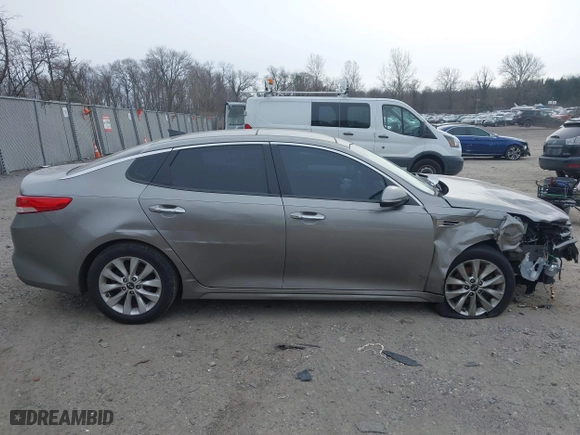 2016 Kia Optima EX with VIN 5XXGU4L33GG108511, listed as a IAAI auction lot 41355565 with 167,111 mi miles. Bid and sale history available at carsss.com. Image 13.