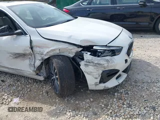 2021 BMW 2 Series 228i with VIN WBA53AK06M7H55442, listed as a IAAI auction lot 42127060 with 95,737 mi miles and . Bid and sale history available at DreamBid. Image 6.