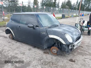 2005 MINI Hardtop with VIN WMWRC33575TJ69197, listed as a IAAI auction lot 41820226 with Not Provided miles and . Bid and sale history available at DreamBid. Image 1.