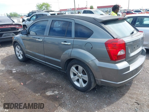 2011 Dodge Caliber Mainstreet with VIN 1B3CB3HA1BD247594, listed as a IAAI auction lot 42082305 with 122,438 mi miles. Bid and sale history available at carsss.com. Image 3.