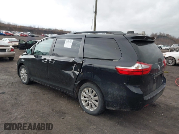 2015 Toyota Sienna Limited with VIN 5TDDK3DC1FS124527, listed as a IAAI auction lot 41723310 with 51,020 mi miles and . Bid and sale history available at DreamBid. Image 3.