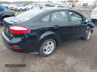2017 Ford Fiesta SE z VIN 3FADP4BJ4HM153649, wystawiony jako IAAI lot #42037378 z przebiegiem 78 540 mil mil oraz . Historia ofert i sprzedaży dostępna na DreamBid. Obrazek 4.