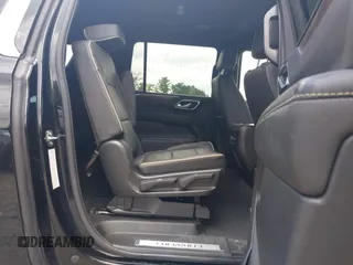 2023 Chevrolet Suburban Premier with VIN 1GNSKFKDXPR385697, listed as a IAAI auction lot 42601771 with 75,487 mi miles and . Bid and sale history available at DreamBid. Image 8.