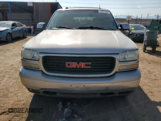 2004 GMC Yukon SLT with VIN 1GKEK13Z34J235318, listed as a Copart auction lot 74971334 with 189,771 mi miles and Salvage Title. Bid and sale history available at carsss.com. Image 5.