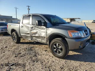 2013 Nissan Titan SV with VIN 1N6BA0EC3DN310724, listed as a Copart auction lot 84192004 with 165,959 mi miles and Salvage title. Bid and sale history available at DreamBid. Image 4.