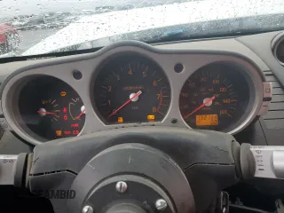 2004 Nissan 350Z Enthusiast with VIN JN1AZ34D94M102763, listed as a Copart auction lot 45170465 with 132,133 mi miles and Salvage Title. Bid and sale history available at DreamBid. Image 9.