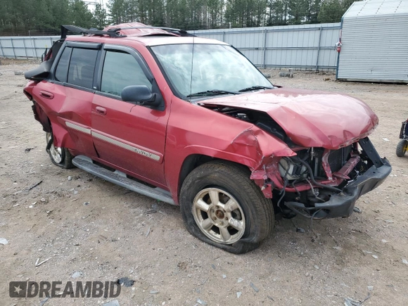 2003 GMC Envoy SLE with VIN 1GKDT13S332136423, listed as a Copart auction lot 49301635 with 148,669 mi miles and Salvage Title. Bid and sale history available at carsss.com. Image 4.