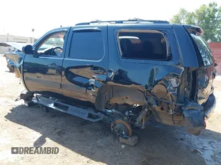2013 Chevrolet Tahoe LS with VIN 1GNSCAE06DR263469, listed as a IAAI auction lot 42245636 with 240,506 mi miles and . Bid and sale history available at DreamBid. Image 3.