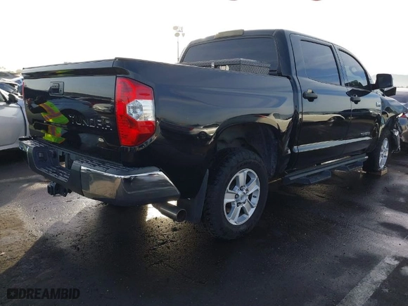 2014 Toyota Tundra 2WD Truck SR5 with VIN 5TFEY5F13EX161341, listed as a IAAI auction lot 40934818 with 170,441 mi miles. Bid and sale history available at carsss.com. Image 4.