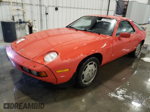 1983 Porsche 928 z VIN WP0JB0929DS860721, wystawiony jako Copart lot #85290544 z przebiegiem 143 702 mil mil oraz Czysty tytuł • Clean title. Historia ofert i sprzedaży dostępna na DreamBid. Obrazek 1.