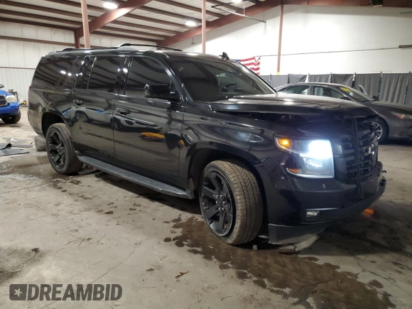 2019 Chevrolet Suburban Premier with VIN 1GNSKJKC7KR140553, listed as a Copart auction lot 83027274 with 89,835 mi miles and Salvage Title. Bid and sale history available at DreamBid. Image 4.