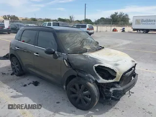 2014 MINI Countryman S with VIN WMWZC3C55EWP25697, listed as a IAAI auction lot 41797132 with Not Provided miles and . Bid and sale history available at DreamBid. Image 1.